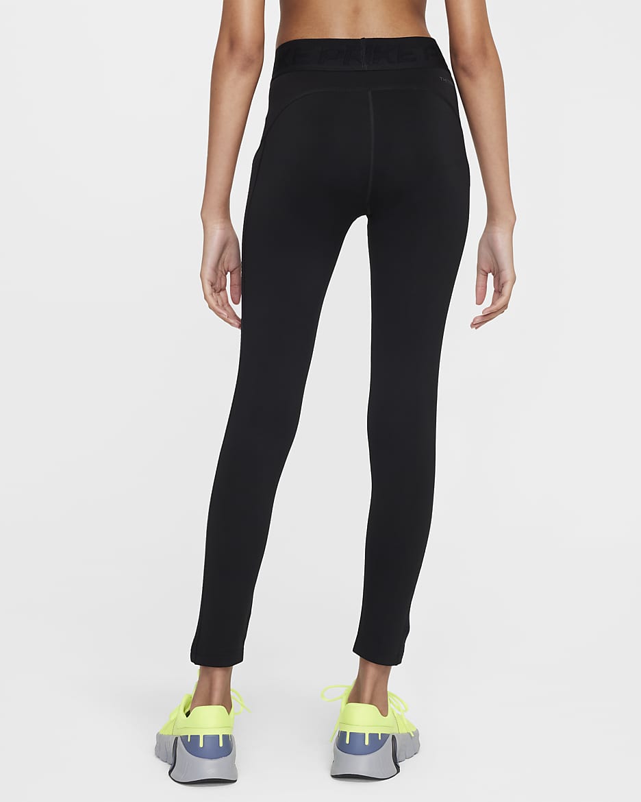 Legging taille mi haute Therma FIT Nike Pro pour fille. Nike CA